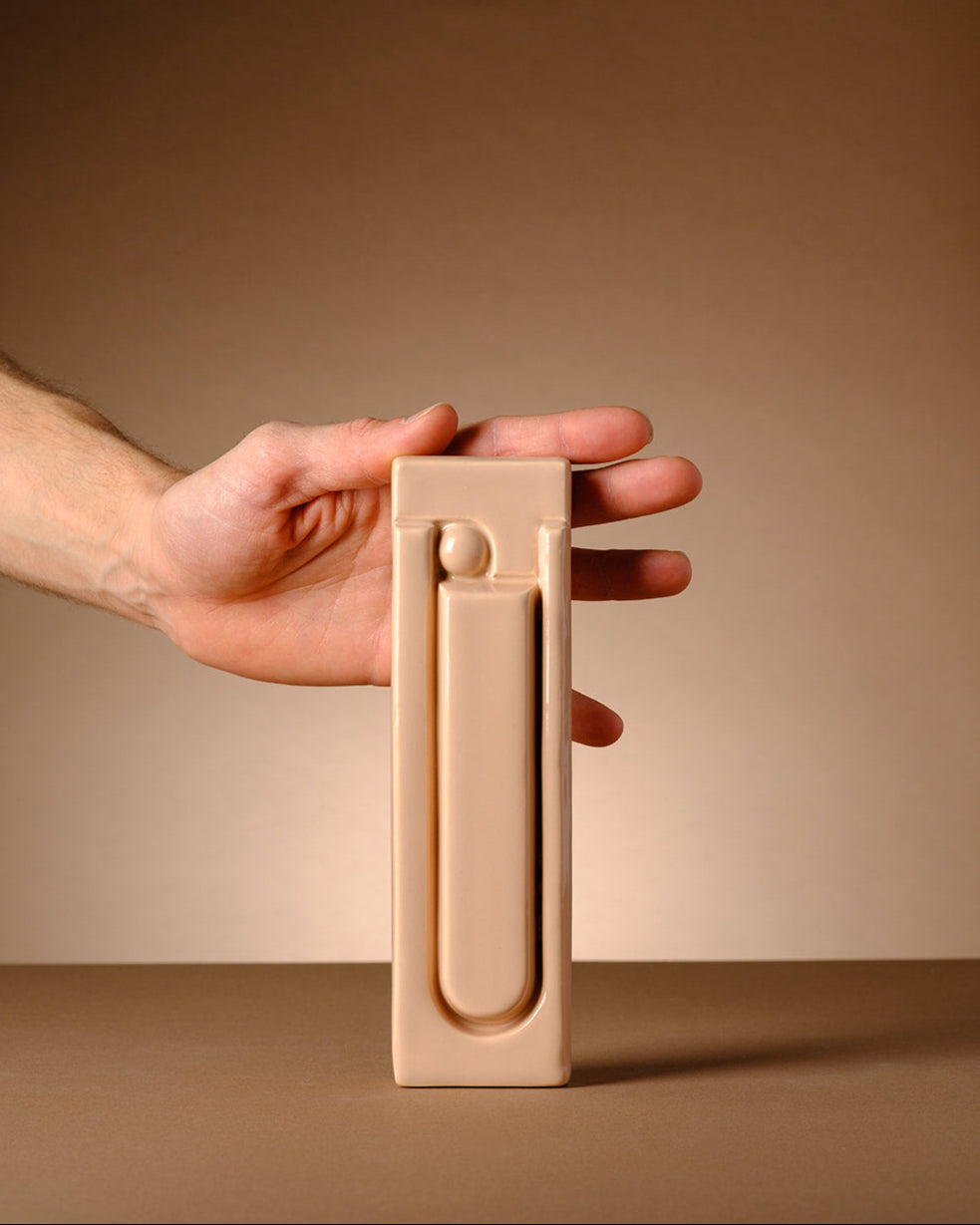 Shaddai - Mezuzah Cover - Modern Judaica Handmade in the Holy Land by ABS Objects. Modern ceramic mezuzah cover handmade in Tel Aviv, featuring a minimalist Brutalist design and the Hebrew letters שד״י embossed on the front, in soft matte stoneware.