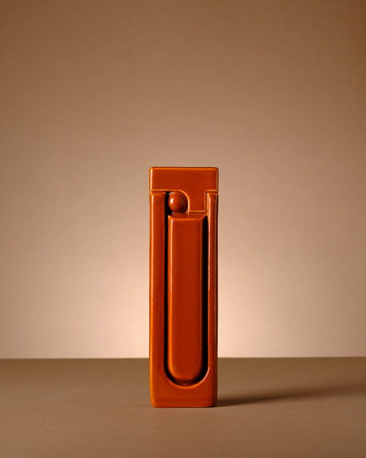 "Modern ceramic mezuzah cover handmade in Tel Aviv, featuring a minimalist Brutalist design and the Hebrew letters שד״י embossed on the front, in soft matte stoneware."
judaica