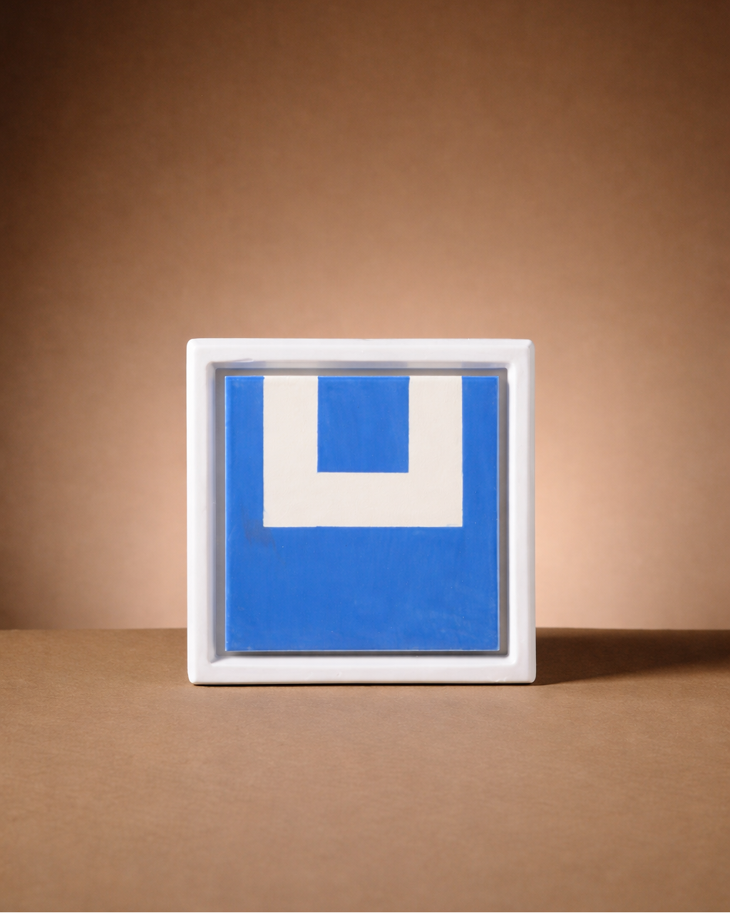 Framed Letter Tiles – The Hebrew Alphabet - Modern Judaica Handmade in Tel Aviv by ABS Objects. Handmade ceramic Hebrew letter tiles framed in stoneware, hand-painted in Tel Aviv. Personalized wall decor for children’s rooms, modern nursery design, or custom home signage. Inspired by Hebrew modernist typography and Israeli visual culture.

