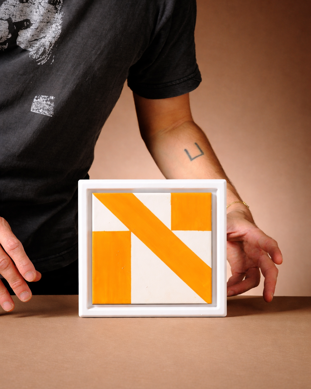 Framed Letter Tiles – The Hebrew Alphabet - Modern Judaica Handmade in Tel Aviv by ABS Objects. Handmade ceramic Hebrew letter tiles framed in stoneware, hand-painted in Tel Aviv. Personalized wall decor for children’s rooms, modern nursery design, or custom home signage. Inspired by Hebrew modernist typography and Israeli visual culture.

