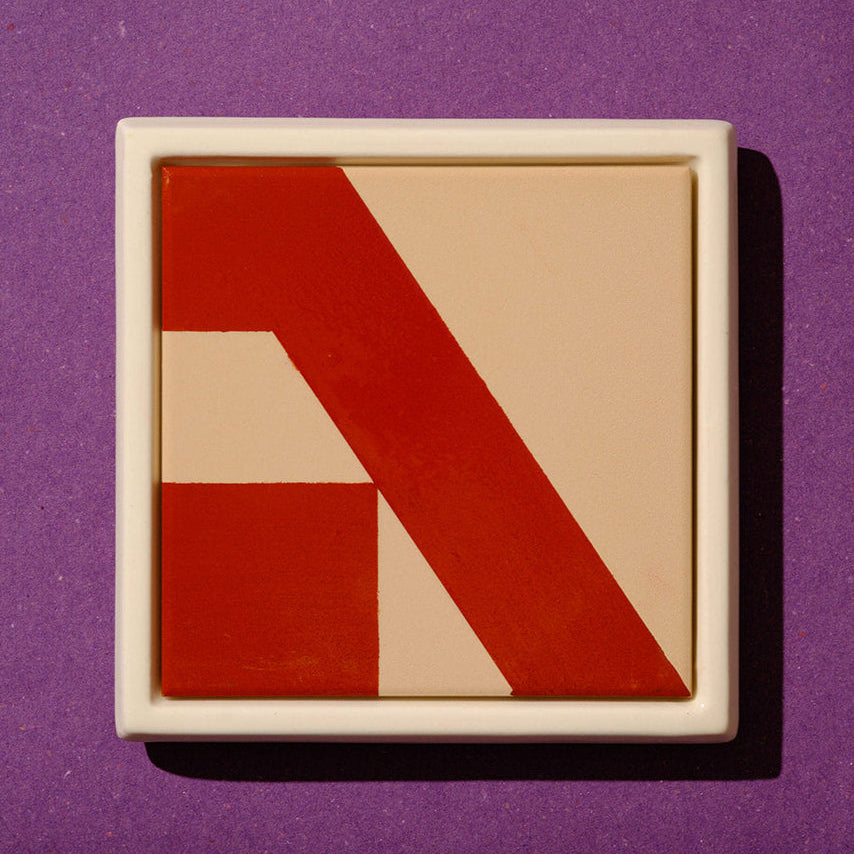 Framed Letter Tiles – The Hebrew Alphabet - Modern Judaica Handmade in Tel Aviv by ABS Objects. Handmade ceramic Hebrew letter tiles framed in stoneware, hand-painted in Tel Aviv. Personalized wall decor for children’s rooms, modern nursery design, or custom home signage. Inspired by Hebrew modernist typography and Israeli visual culture.

