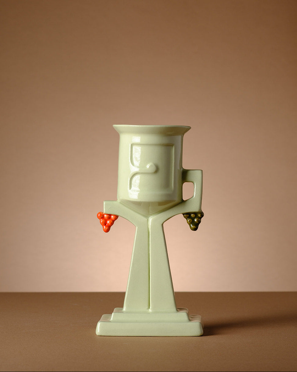 Gefen - Kiddush Cup - Handmade Modern Judaica made to order in the Holy Land by ABS Objects. Handmade silver Kiddush cup inspired by Tel Aviv water towers, featuring sculpted Hebrew typography spelling the word "Gefen" (גפן). The design combines modern Judaica with architectural and cultural references, blending tradition with contemporary Israeli aesthetics.